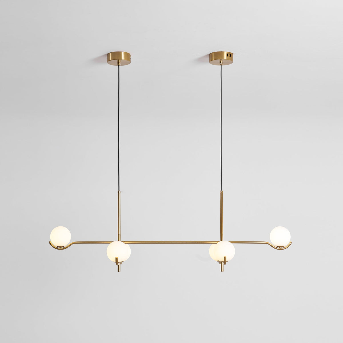 Multi Globe Pendant Light White Glass Shades on Slim Rods Dining Table