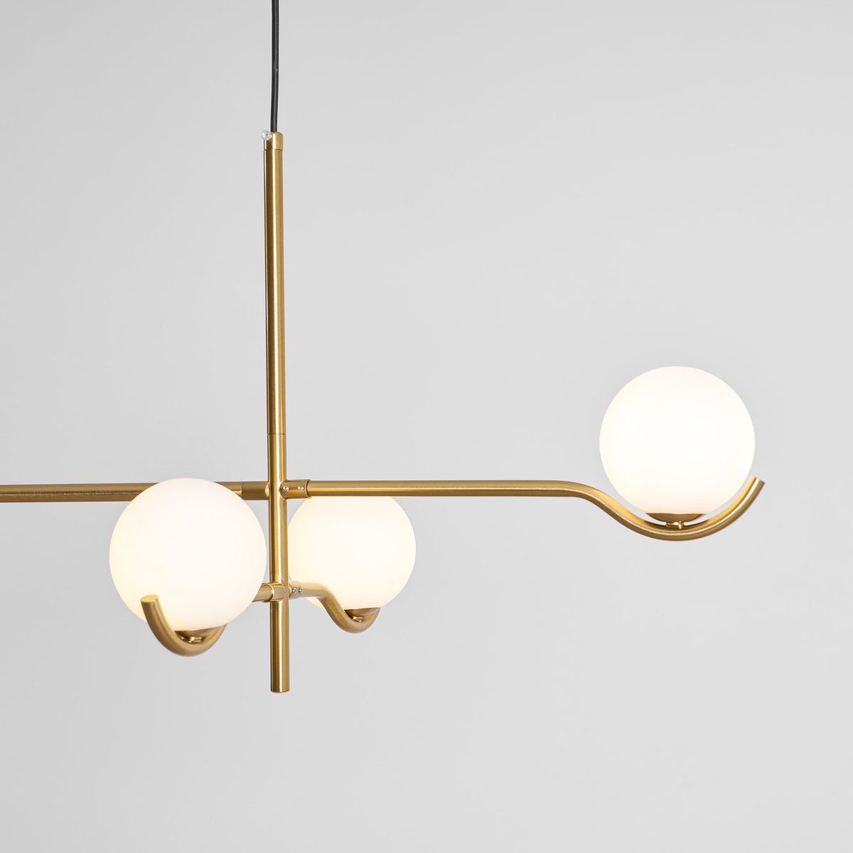 Multi Globe Pendant Light White Glass Shades on Slim Rods Dining Table