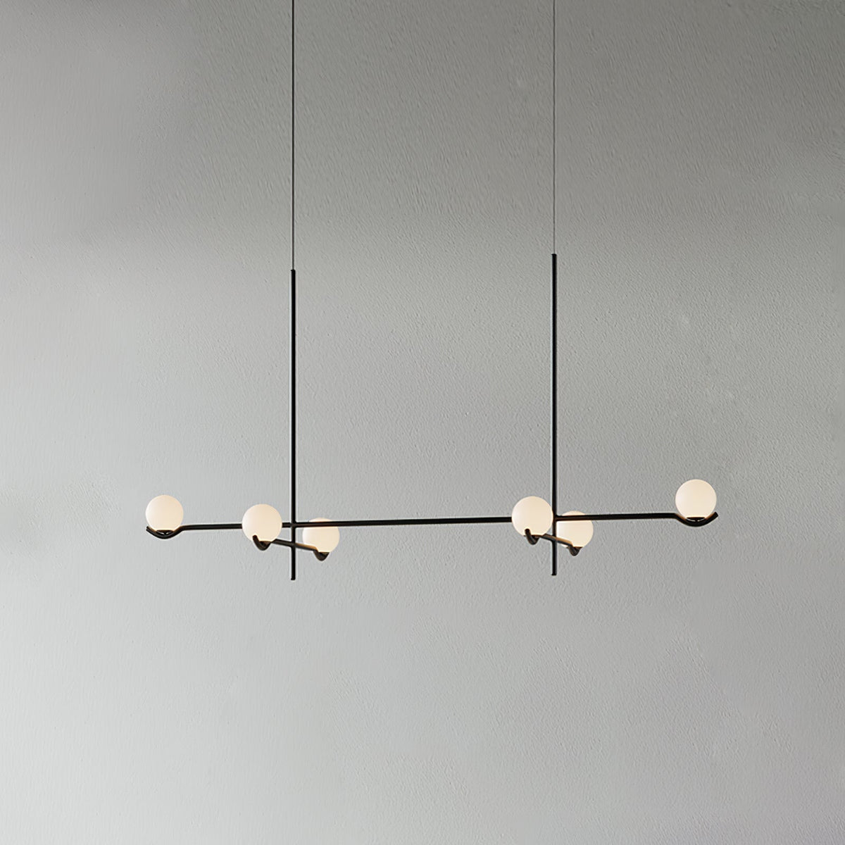 Multi Globe Pendant Light White Glass Shades on Slim Rods Dining Table