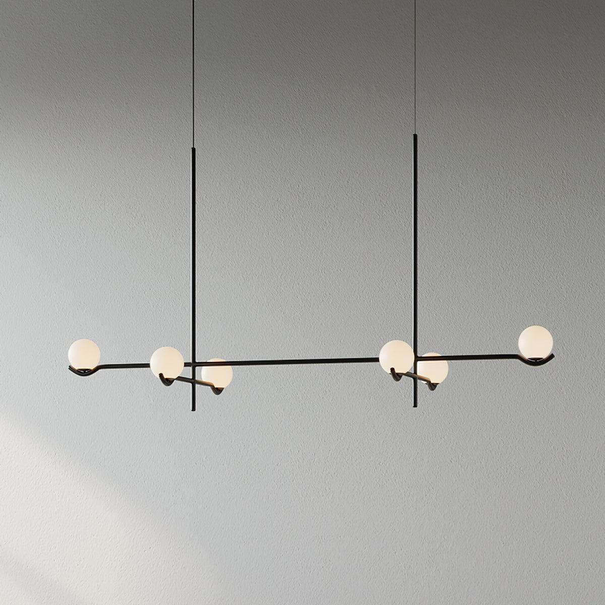 Multi Globe Pendant Light White Glass Shades on Slim Rods Dining Table