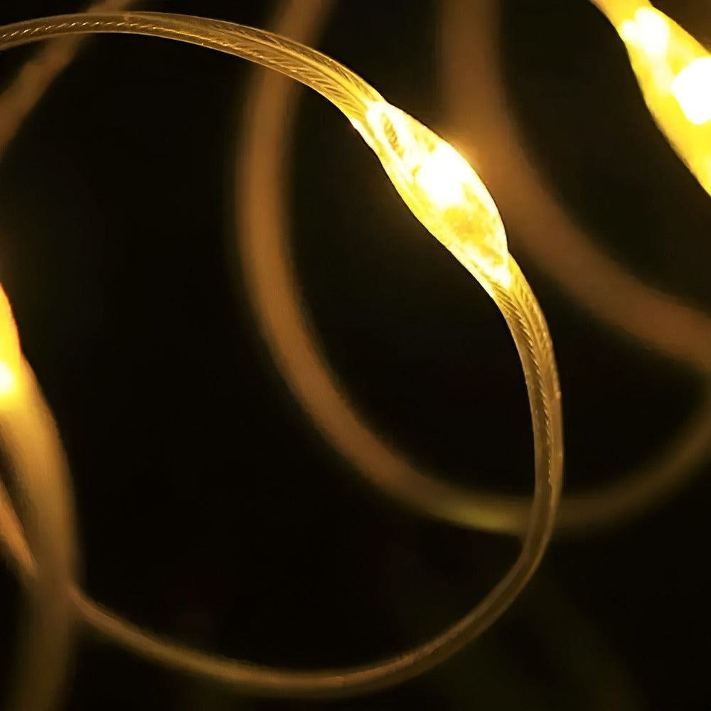 Rund bærbar lampe med flad lysskive og aftagelig base og drejeknap
