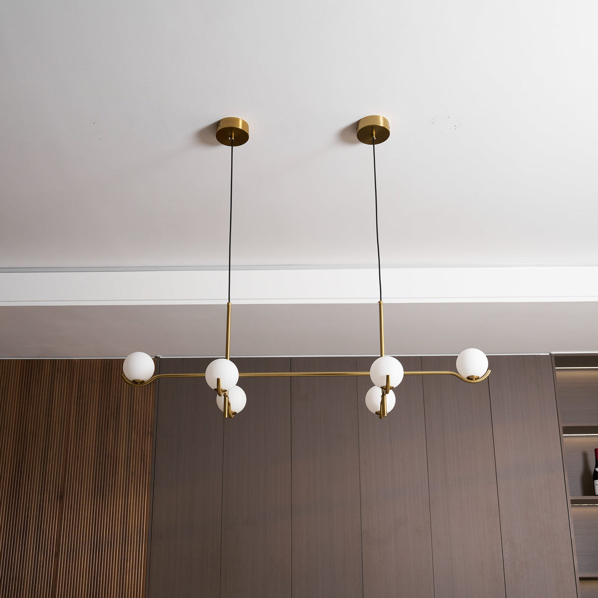 Multi Globe Pendant Light White Glass Shades on Slim Rods Dining Table