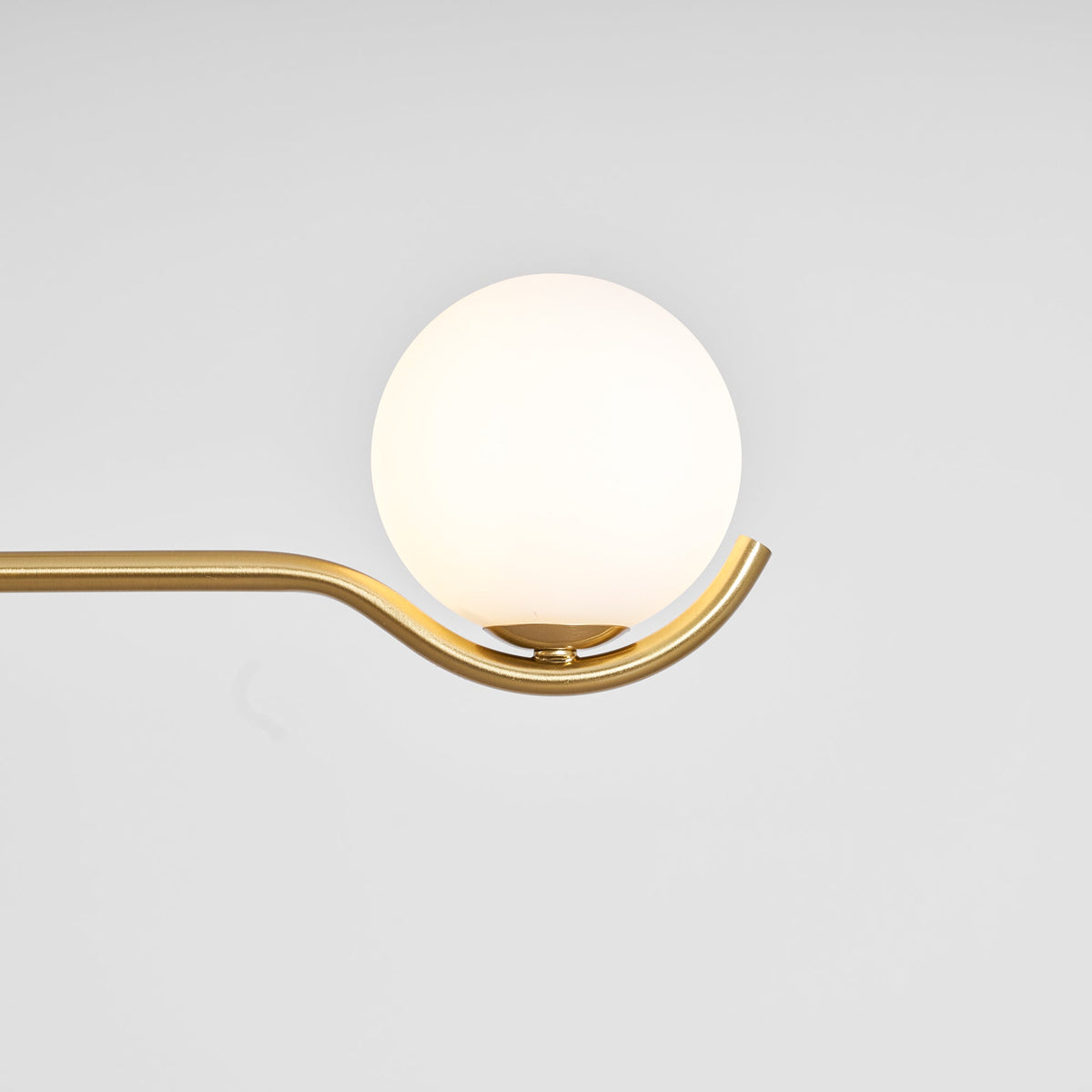 Multi Globe Pendant Light White Glass Shades on Slim Rods Dining Table