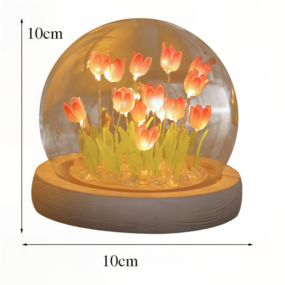 Blomsterlampe lysende tulipaner under glaskuppel med træbase