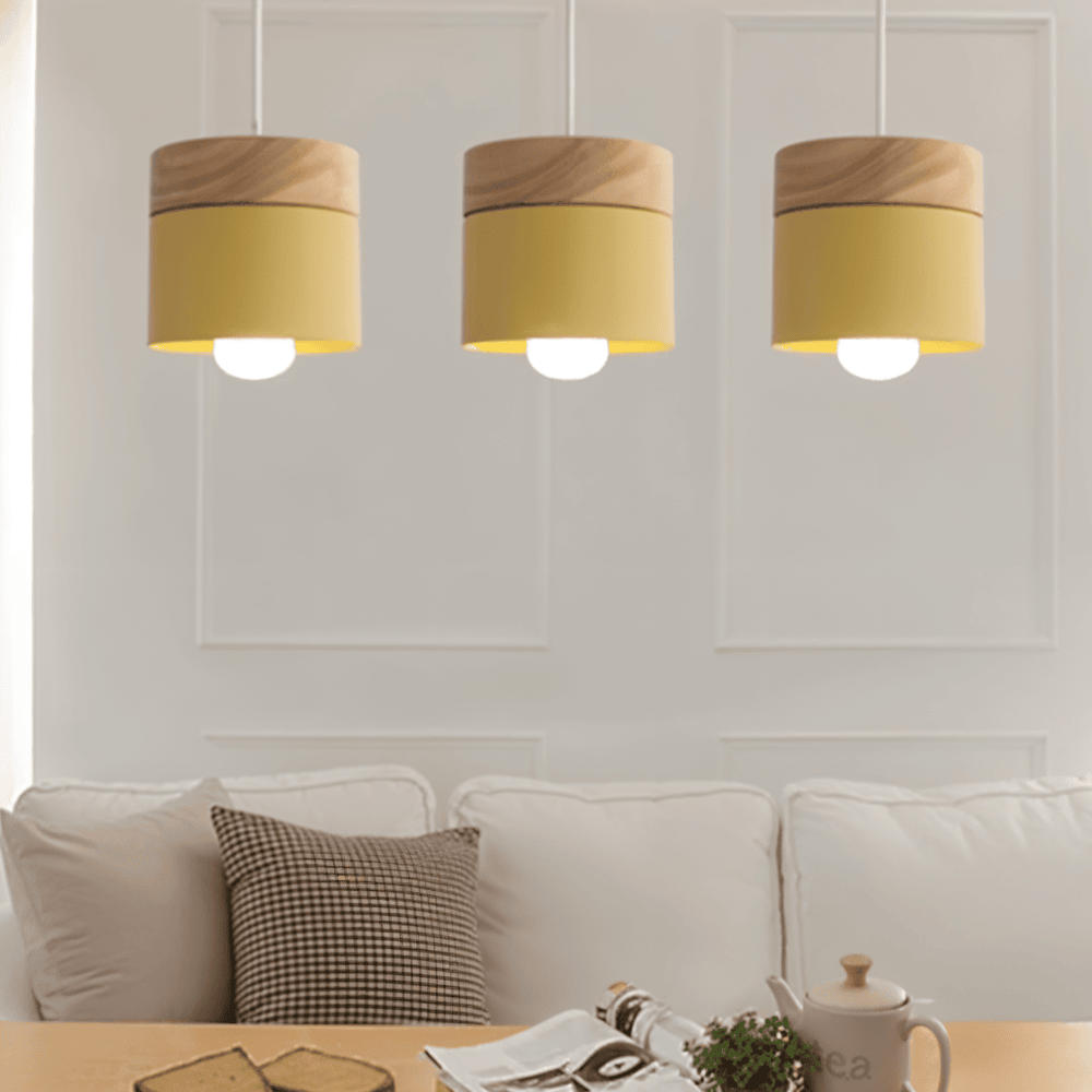 Cylindrisk pendelbordlampe i metal og træ