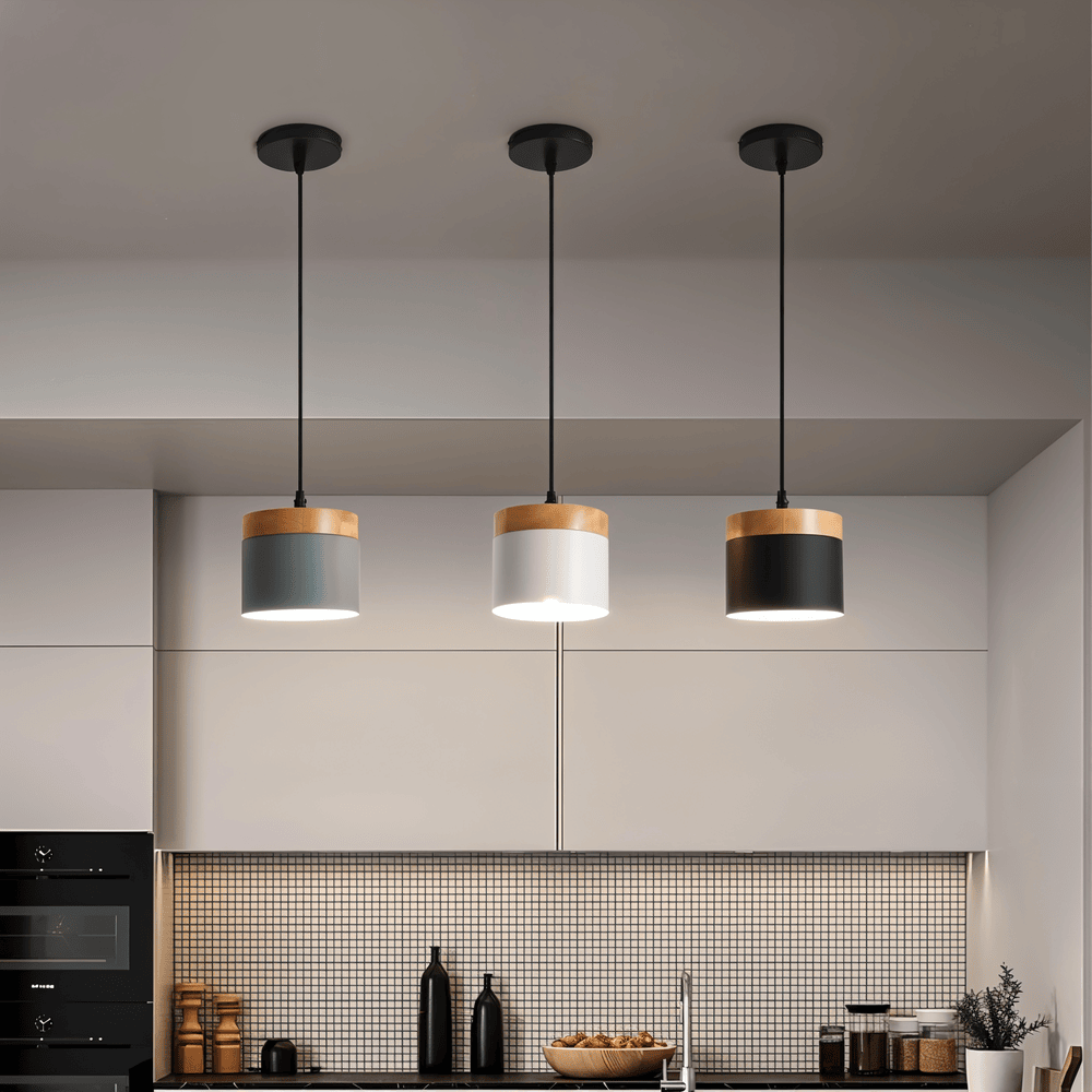 Cylindrisk pendelbordlampe i metal og træ