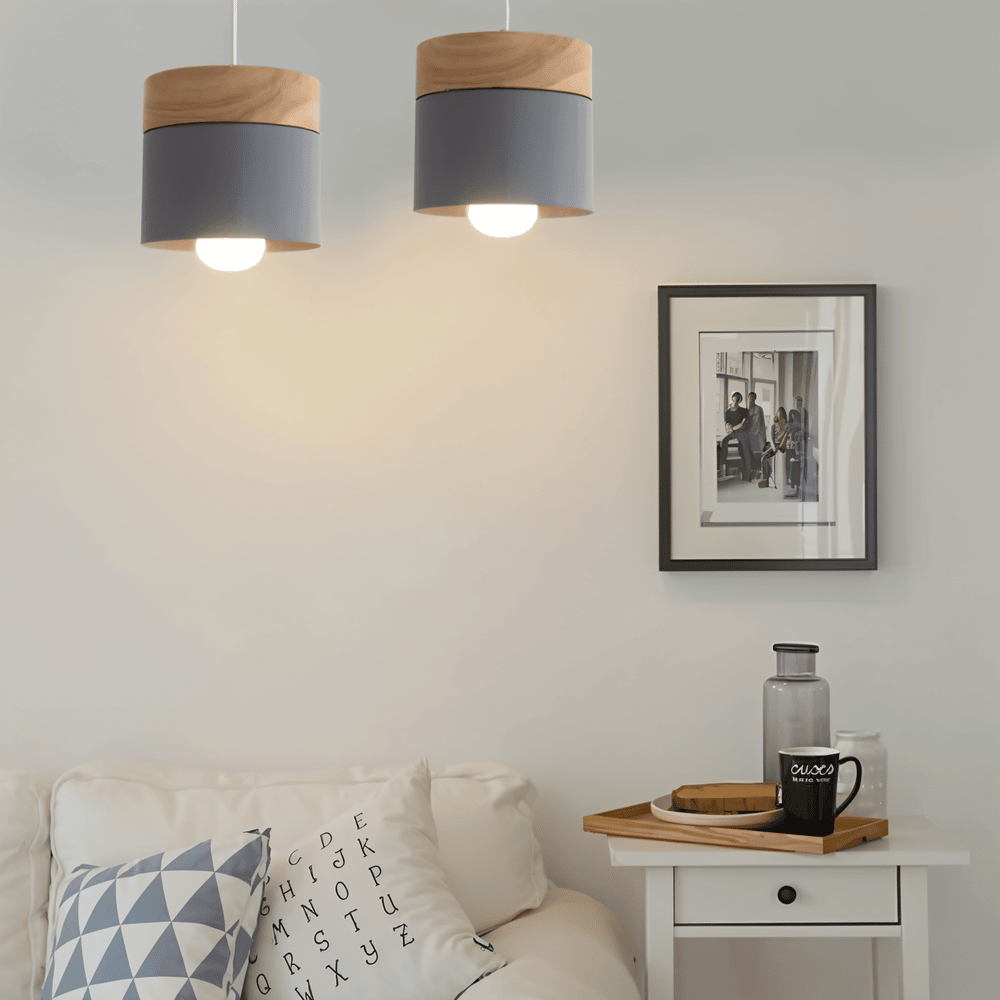 Cylindrisk pendelbordlampe i metal og træ