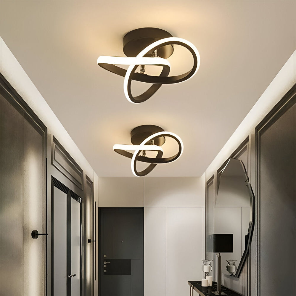 LED loftlampe med skulpturelt snoet design