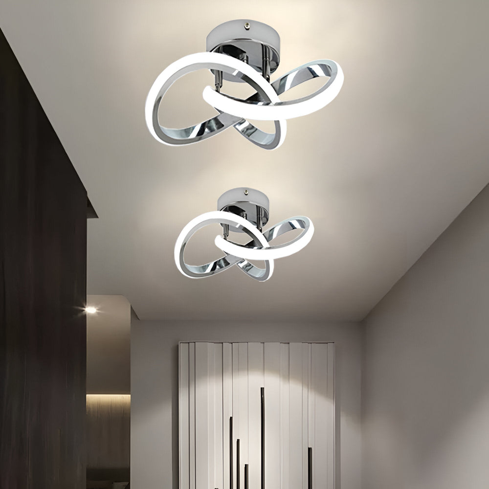 LED loftlampe med skulpturelt snoet design