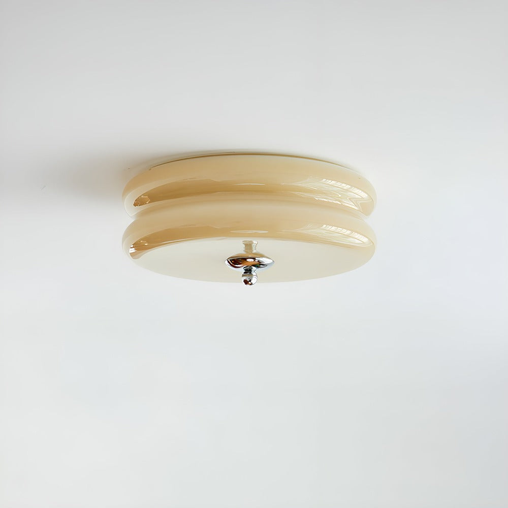 Rund loftlampe i opalglas med krom og gulddetaljer
